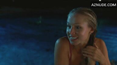 She comes out of the pool in a swimsuit