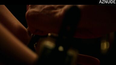 Blindfolded and handcuffed she has no escape