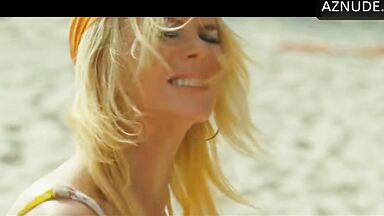 Sexy blonde pisses on him