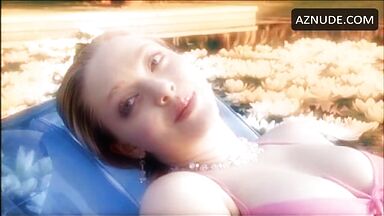 In a swimsuit in the middle of the lake