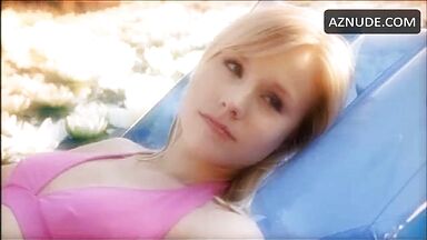 In a swimsuit in the middle of the lake