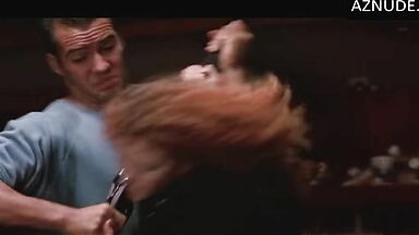 Her panties are visible during the fight
