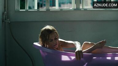 In the bathtub naked and full of desire