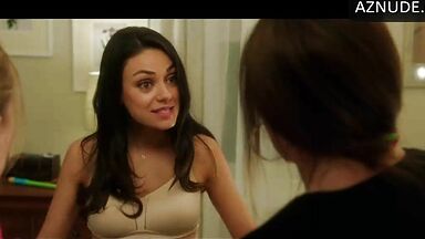 Mila Kunis shows off her new bustier