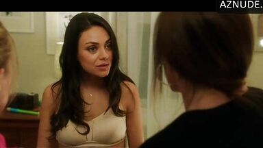 Mila Kunis shows off her new bustier
