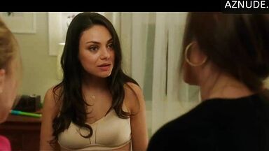 Mila Kunis shows off her new bustier