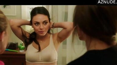 Mila Kunis shows off her new bustier