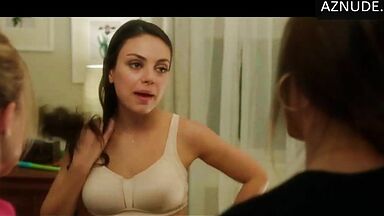 Mila Kunis shows off her new bustier