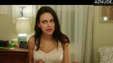 Mila Kunis shows off her new bustier