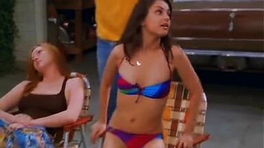 Mila Kunis in a swimsuit with her redhead friend