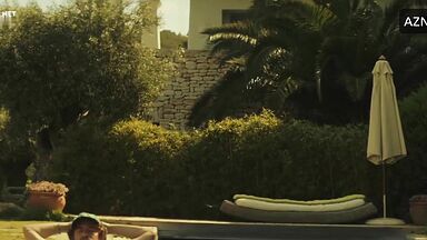 Dakota Johnson in a swimsuit on the beach