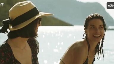 Dakota Johnson in a swimsuit on the beach