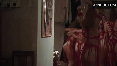 Bizarre dances with Dakota Johnson Mia Goth