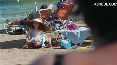 Dakota Johnson at the beach with her daughter
