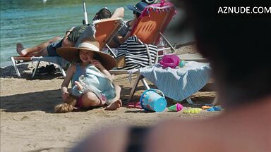 Dakota Johnson at the beach with her daughter