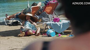 Dakota Johnson at the beach with her daughter