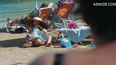 Dakota Johnson at the beach with her daughter
