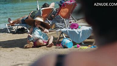 Dakota Johnson at the beach with her daughter