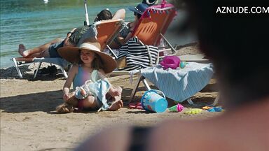 Dakota Johnson at the beach with her daughter