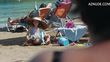 Dakota Johnson at the beach with her daughter