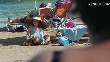 Dakota Johnson at the beach with her daughter