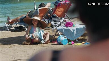 Dakota Johnson at the beach with her daughter