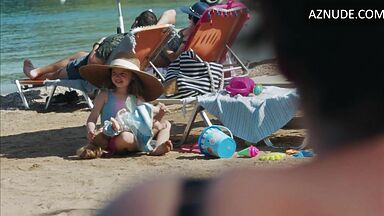 Dakota Johnson at the beach with her daughter