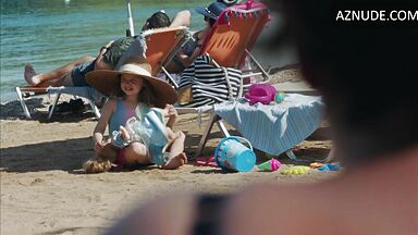 Dakota Johnson at the beach with her daughter