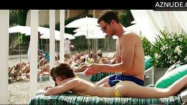 Dakota Johnson takes off her swimsuit