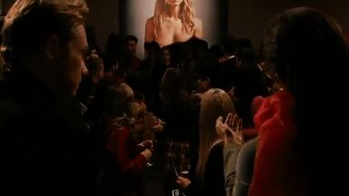 Watching her own nude portrait