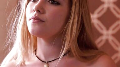 Showing her bust