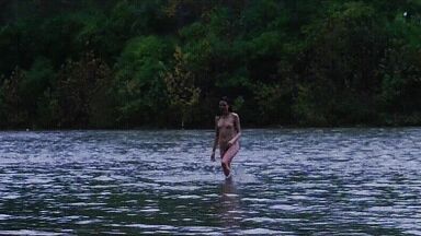 Washing naked on river
