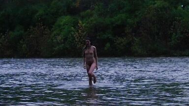 Washing naked on river