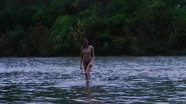 Washing naked on river