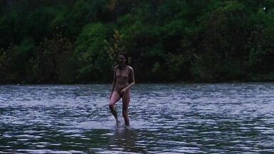 Washing naked on river