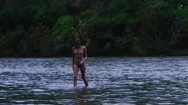 Washing naked on river