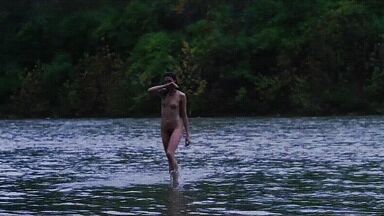 Washing naked on river