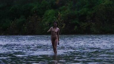 Washing naked on river