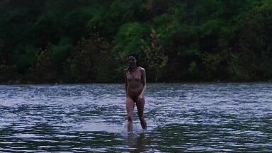 Washing naked on river