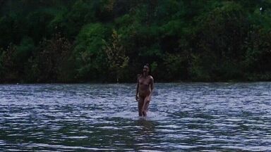 Washing naked on river