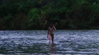 Washing naked on river