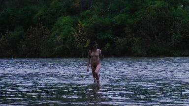 Washing naked on river