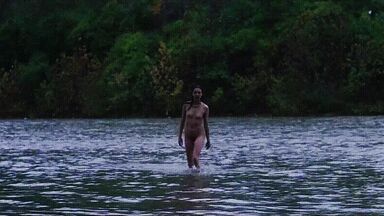 Washing naked on river