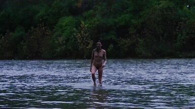 Washing naked on river