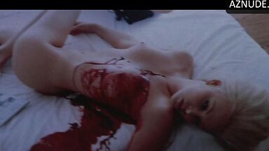 Charlize Theron with a naked body and tits on display
