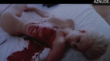 Charlize Theron with a naked body and tits on display