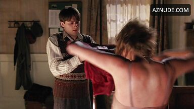 Charlize Theron soaked to the skin