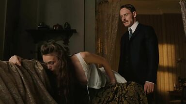 Keira Knightley spanked on the sofa