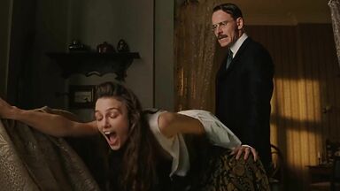Keira Knightley spanked on the sofa