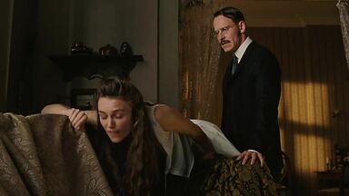 Keira Knightley spanked on the sofa